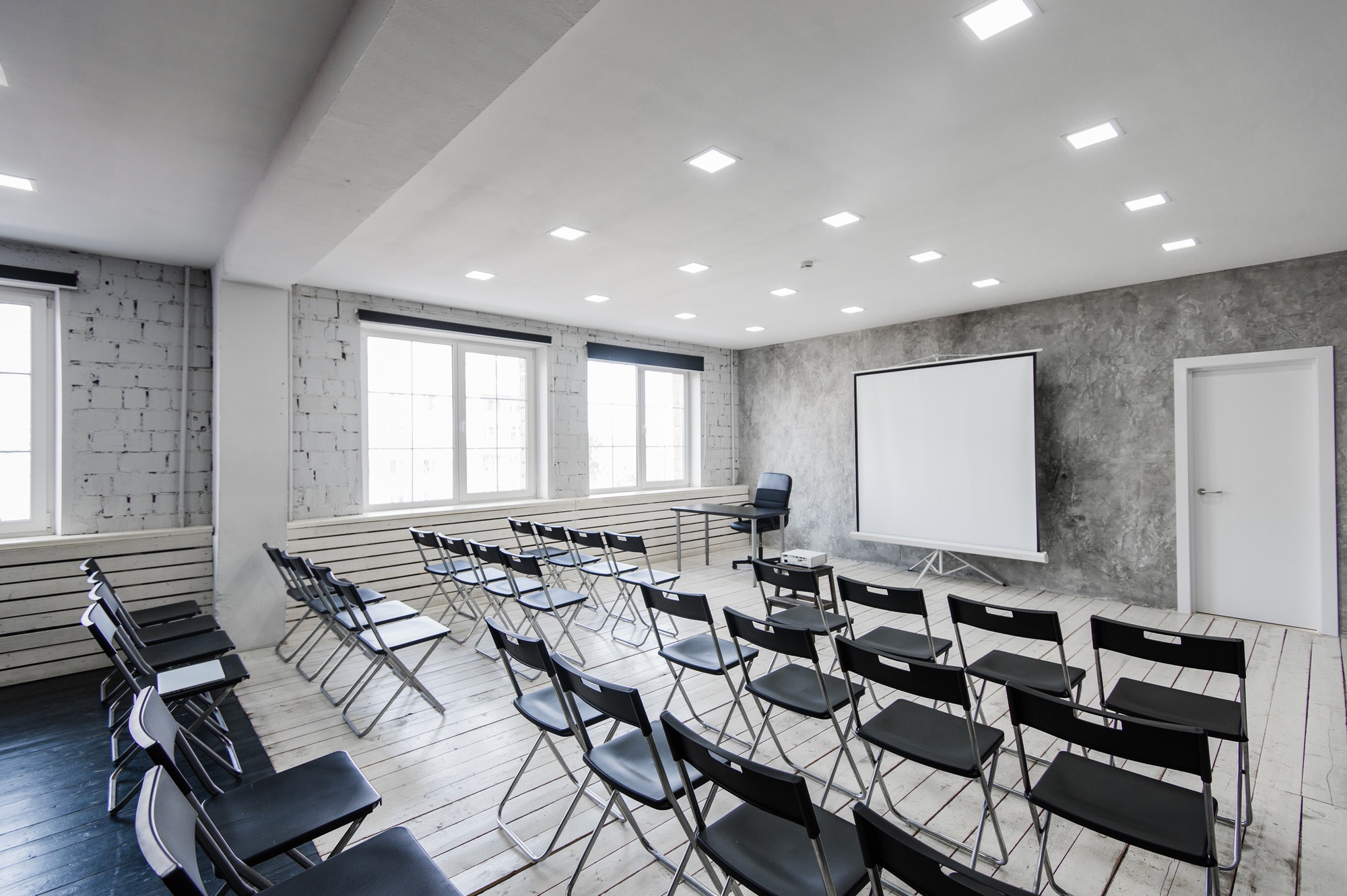 Empty classroom with chairs and desks